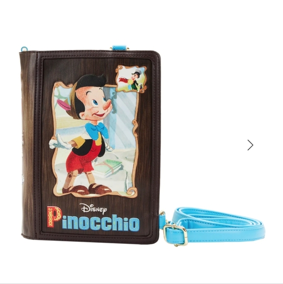 Loungefly NWT Pinocchio Storybook Convertible Backpack & Crossbody Bag - Picture 1 of 16